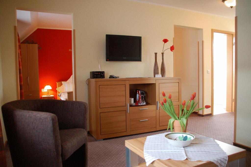 Hotel-Ferienwohnungen Cafe Maarblick Schalkenmehren Pokoj fotografie